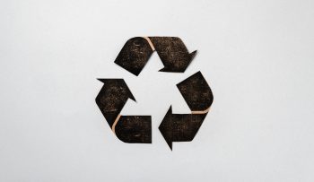 Recycling eco concept with cardboard recycle sign, copy space